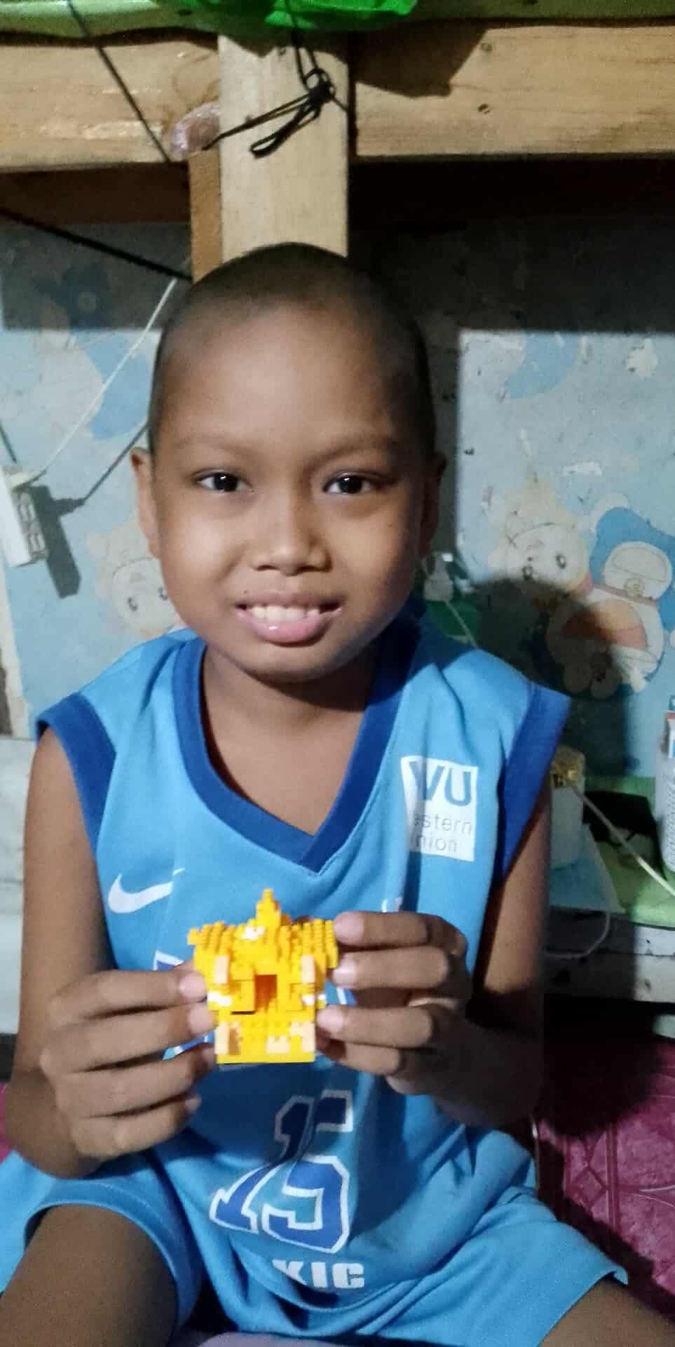 Child receiving care at Adonai's Mercy House